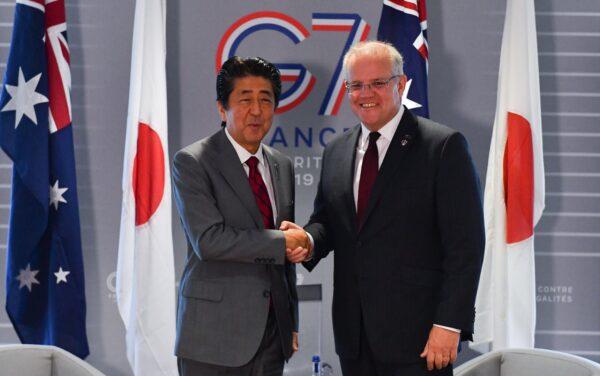 Japan's Prime Minister Shinzo Abe meets with Australia's Prime Minister Scott Morrison for a bilateral meeting during the G7 Summit in the town of Biarritz, 800km south of Paris in France, on Aug. 25, 2019. (AAP Image/Mick Tsikas)