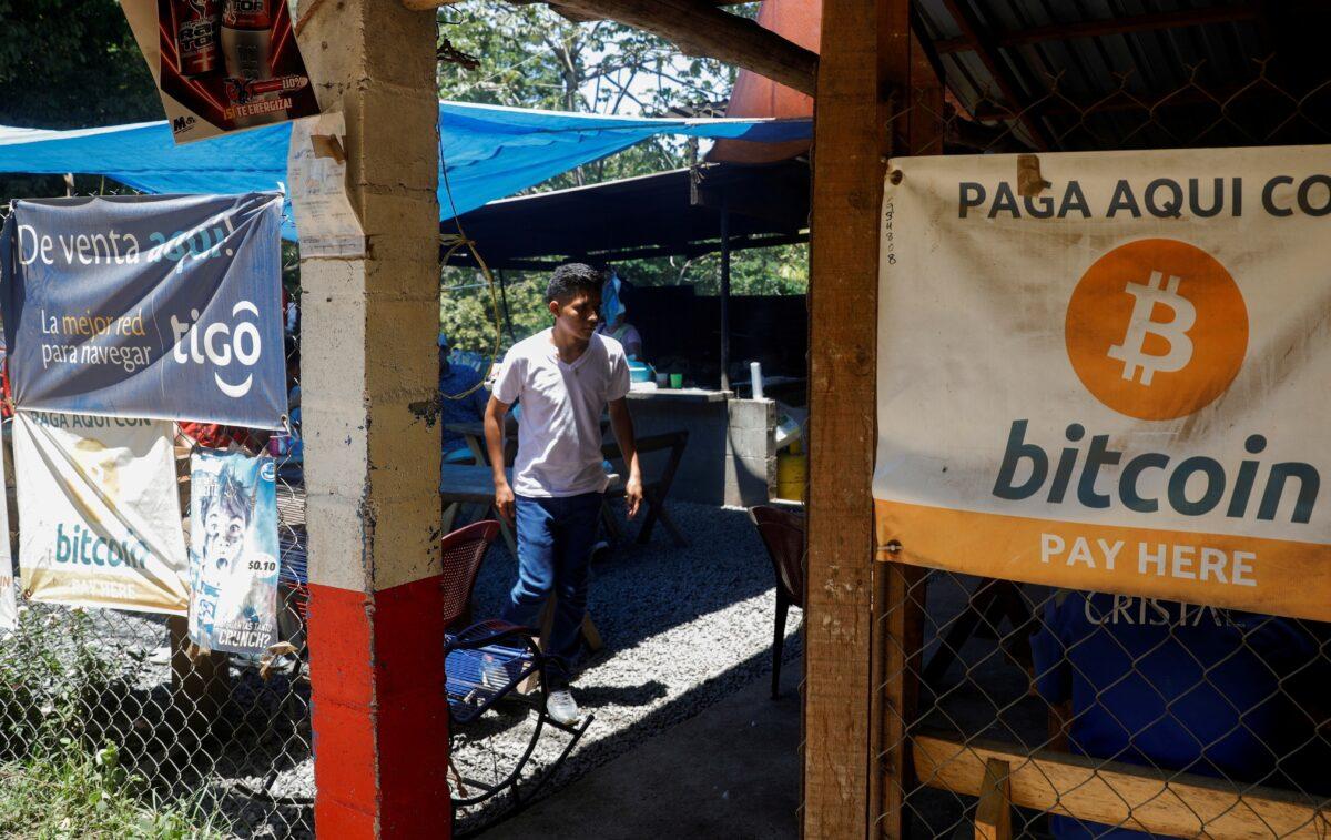 Bitcoin banners are seen outside of a small restaurant at El Zonte Beach in Chiltiupan, El Salvador, on June 8, 2021. (Jose Cabezas/Reuters)