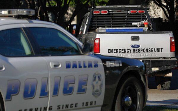 A Dallas police car and an emergency response vehicle in a file photo. (Mike Stone/Getty Images)