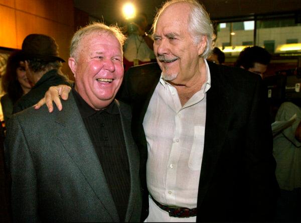 Director-producer Robert Altman (R) laughs with actor Ned Beatty prior to the 25th anniversary screening of "Nashville," at the Academy of Motion Picture Arts and Sciences in Beverly Hills, Calif., on June 22, 2000. (Michael Caulfield/AP Photo)