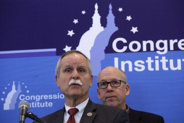Rep. David McKinley (R-W.Va.) (L) and Chairman of House Energy and Commerce Committee Rep. Greg Walden (R-Ore.) participate in a news conference at the Greenbrier resort in White Sulphur Springs, W. Va., on Feb. 2, 2018. (Alex Wong/Getty Images)