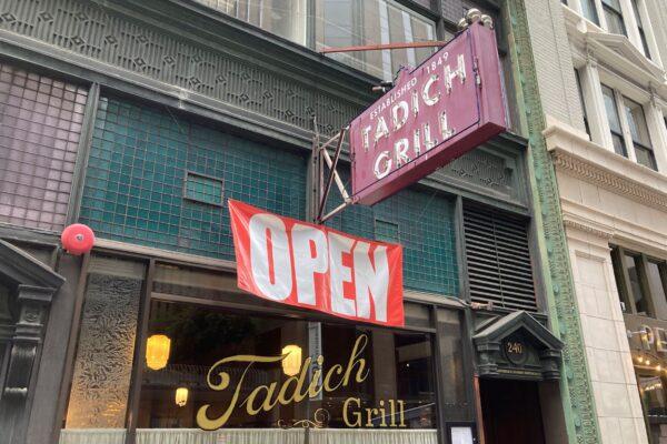 An open banner hangs outside the Tadich Grill, California's oldest restaurant, in San Francisco, Calif., on June 4, 2021. (Eric Risberg/AP Photo)