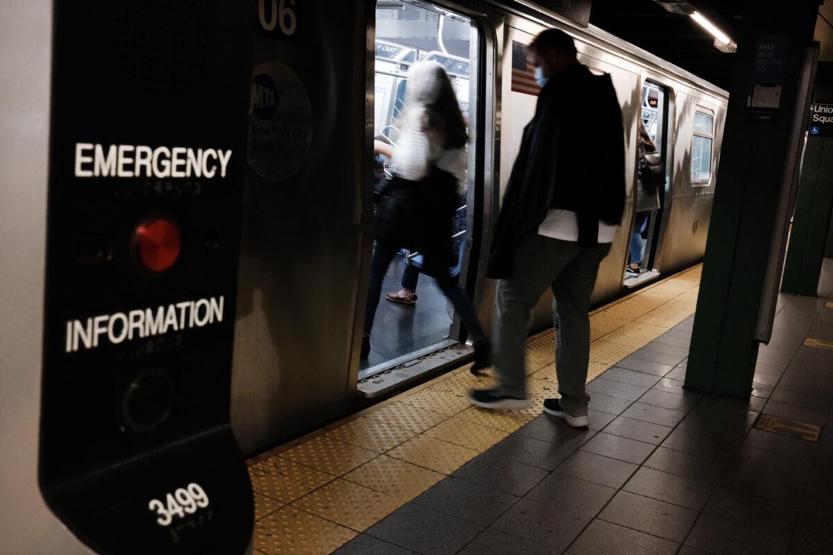 People use the New York City subway in New York City, on June 3, 2021. New York transit officials confirm MTA's systems were hacked in April. (Spencer Platt/Getty Images)
