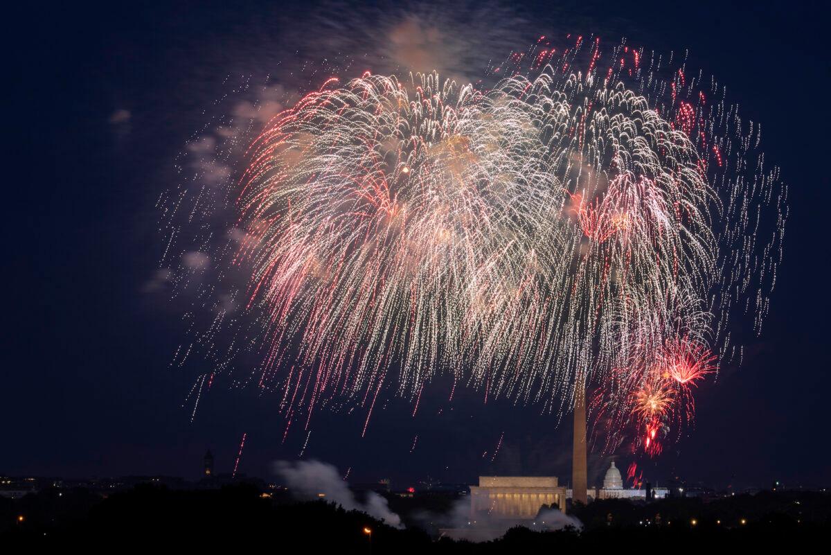 Fourth of July fireworks explode over the Lincoln Memorial, Washington Monument, and U.S. Capitol, on July 4, 2020. (Cliff Owen/AP Photo)