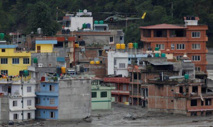 Flash Floods Kill 10 People in Bhutan; Seven Missing in Nepal