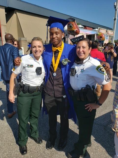 (L–R) Sgt. Kara Vance, Quintin, and Cpl. Andrea Davis. (Courtesy of <a href="https://teamhcso.com/">Hillsborough County Sheriff's Office</a>)