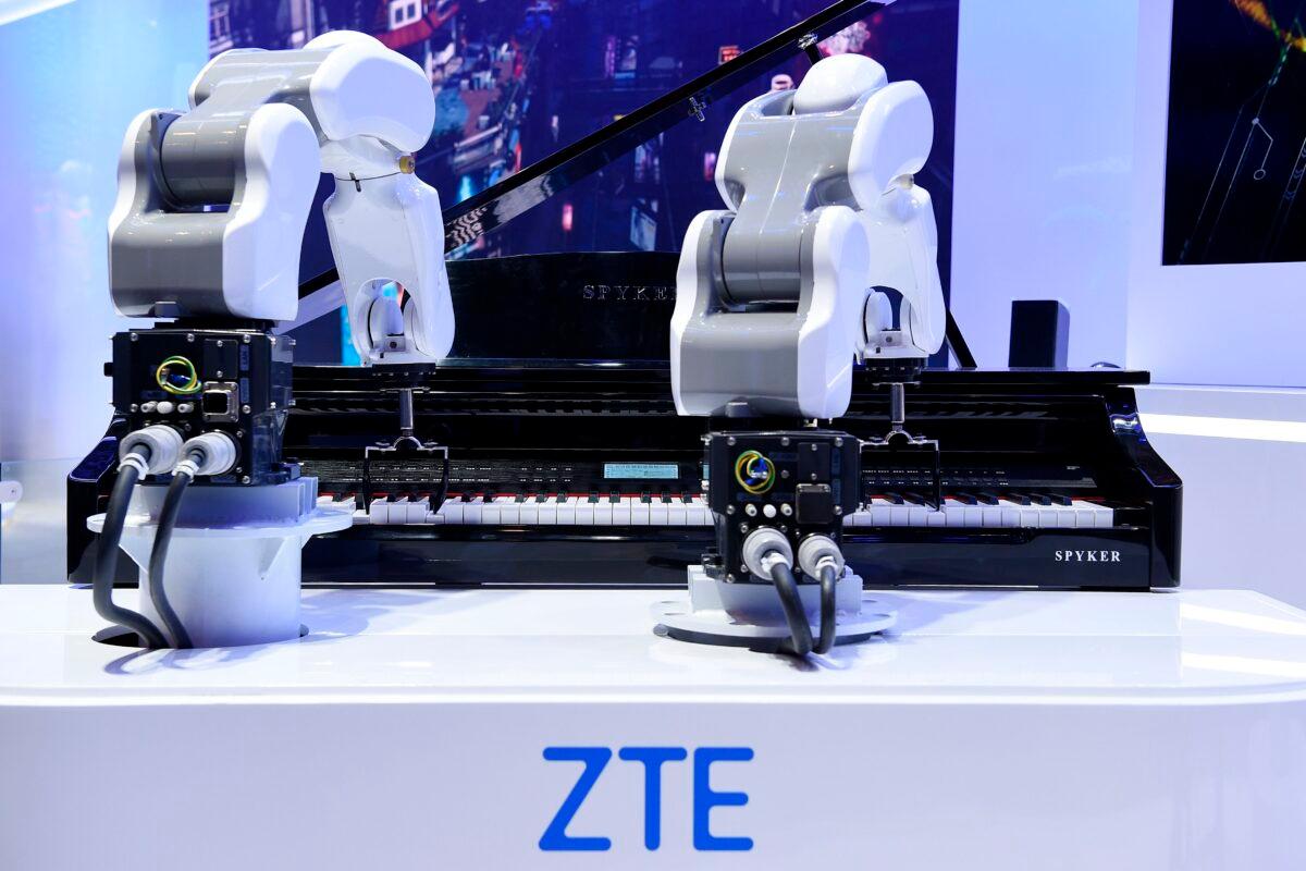 ZTE musician robots play the piano at the Mobile World Congress (MWC) in Barcelona on February 25, 2019. (Lluis Gene/AFP via Getty Images)