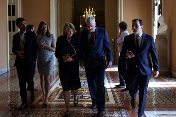 Sen. Lisa Murkowski (R-AK) (L) and Sen. Bill Cassidy (R-LA) (R) leave the office of Senate Minority Leader Mitch McConnell (R-KY) following a meeting on Capitol Hill in Washington on June 9, 2021. (Anna Moneymaker/Getty Images)