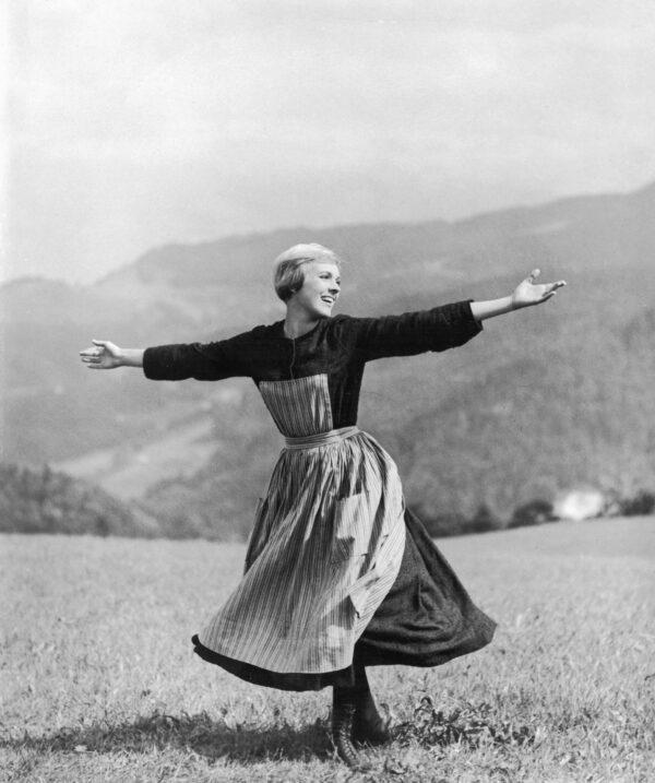Julie Andrews in the opening scene of Rodgers and Hammerstein’s 'The Sound of Music.” (Photo by Hulton Archive/Getty Images)