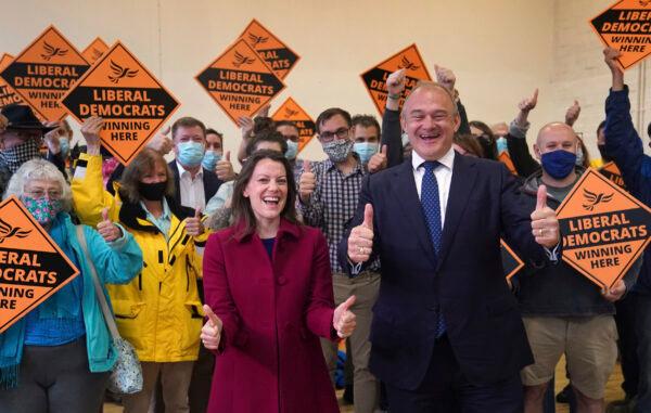 Liberal Democrat leader Ed Davey and new Liberal Democrat MP for Chesham and Amersham Sarah Green during a victory rally at Chesham Youth Centre in Chesham, England, on June 18, 2021. (Steve Parsons/PA via AP)