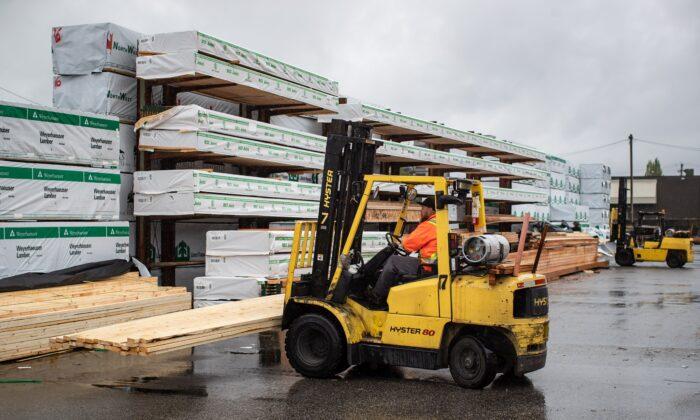 Soaring Lumber Prices Driving Up Construction Costs May Have Peaked