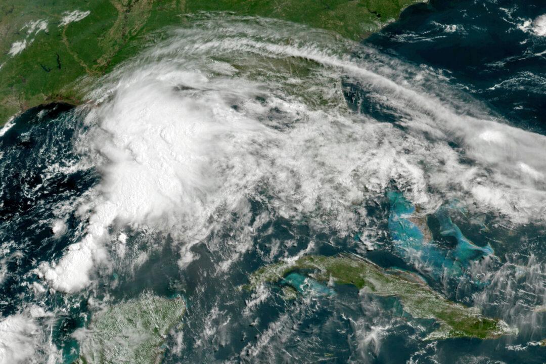Tropical Weather Lashes Gulf Coast With Brisk Winds, Rain