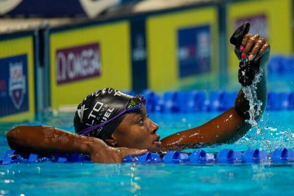 Simone Manuel reacts after the women's 50 freestyle during wave 2 of the U.S. Olympic Swim Trials in Omaha, Neb., on June 19, 2021. (Jeff Roberson/AP Photo)