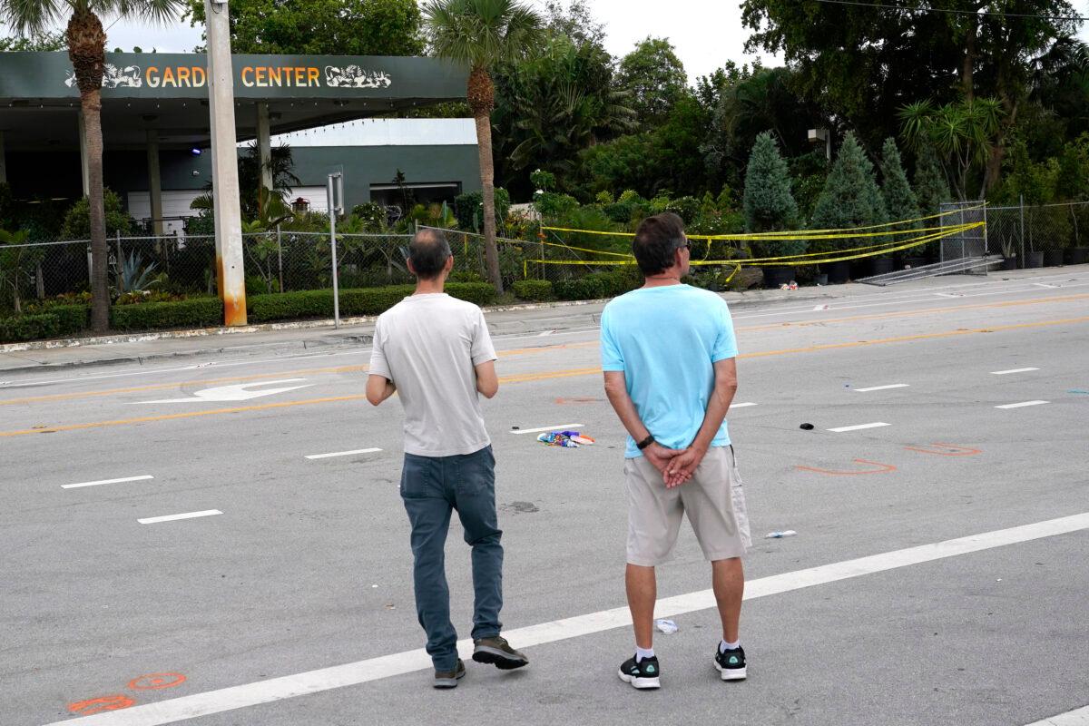 People look at the site where a driver slammed into spectators at the start of a gay pride parade in Fort Lauderdale, Fla., on June 20, 2021. (Lynne Sladky/(AP Photo)