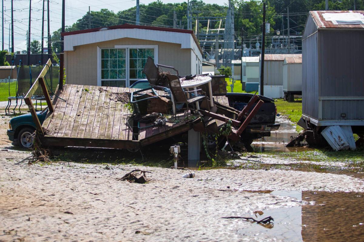 Debris is shown from flooding in Northport, Ala., on June 20, 2021. (Vasha Hunt/AP Photo)