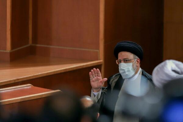 Iran's President-elect Ebrahim Raisi attends a news conference in Tehran, Iran, on June 21, 2021. (Majid Asgaripour/WANA via Reuters)