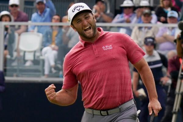 Jon Rahm, of Spain, reacts to making his birdie putt on the 18th green during the final round of the U.S. Open Golf Championship, at Torrey Pines Golf Course in San Diego, Calif., on June 20, 2021. (Gregory Bull/AP Photo)