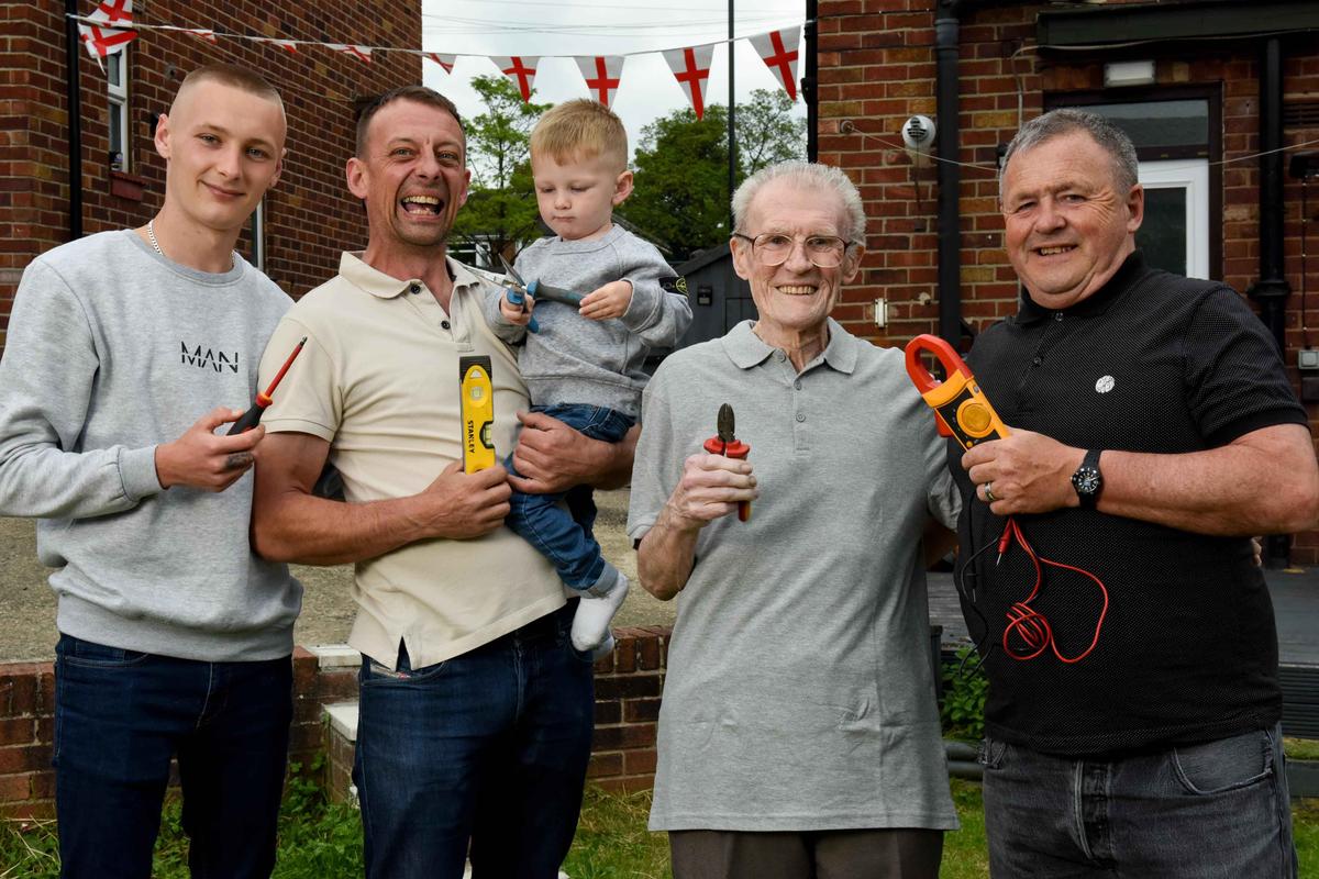 (L–R) Danny, Lee, Archie, Neville Sr., and Neville Jr. holding up electrician tools. (Caters News)