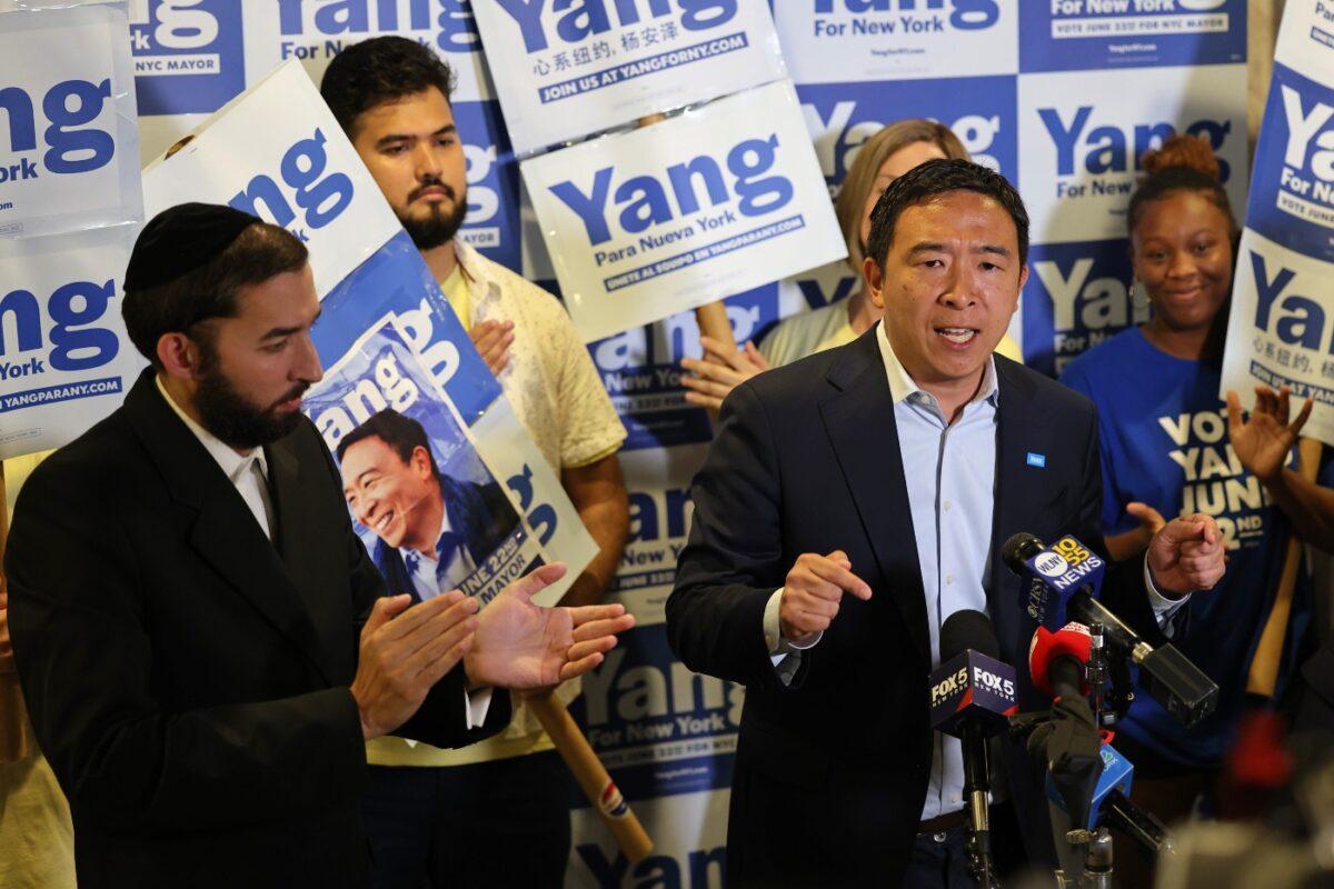 New York City mayoral candidate Andrew Yang speaks during a press conference with Assembly Member Simcha Eichenstein (L) in the Bensonhurst neighborhood of Brooklyn borough in New York City, on June 21, 2021. (Michael M. Santiago/Getty Images)