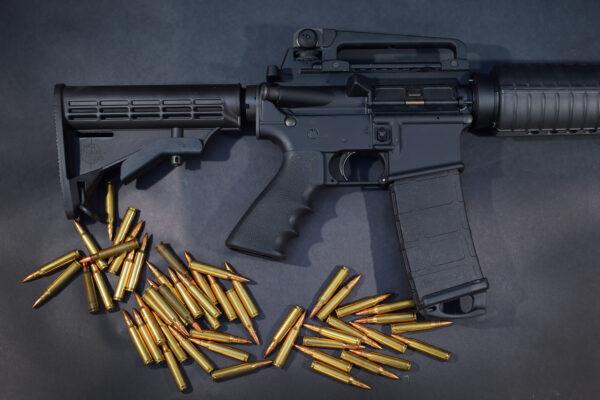 In this photo illustration, a Rock River Arms AR-15 rifle is seen with ammunition in Miami, Fla., on Dec. 18, 2012. (Joe Raedle/Getty Images)