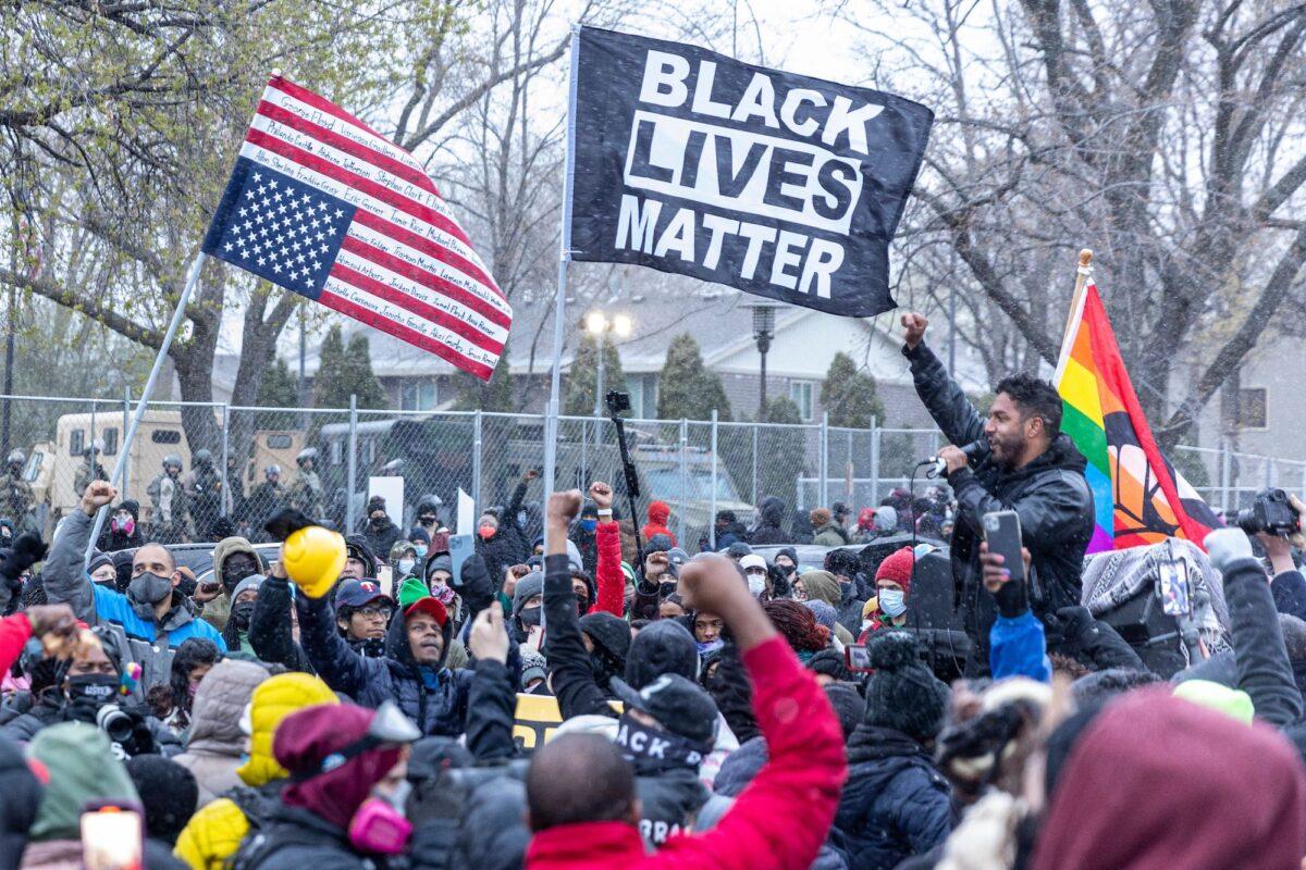 Protesters rally outside the Brooklyn Center police station in Brooklyn Center, Minn., on April 13, 2021. (Kerem Yucel/AFP via Getty Images)