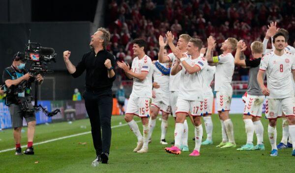 Denmark's manager Kasper Hjulmand applauds spectators at the end of the Euro 2020 soccer championship group B match between Denmark and Russia at the Parken stadium in Copenhagen, on June 21, 2021. (Martin Meissner/Pool/AP Photo)