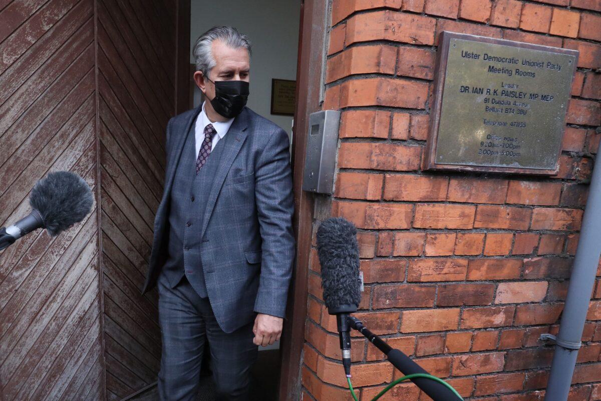 Edwin Poots leaves the DUP headquarters in Belfast in an undated photo. (Brian Lawless/PA)