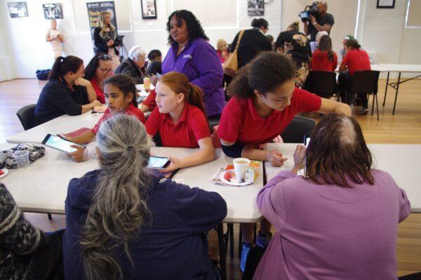 Darlington Public School students help Aboriginal elders use technology at Redfern Community Centre in Sydney, Australia, on Nov. 7, 2017. (AAP Image/Supplied by the Department of Family and Community Services)
