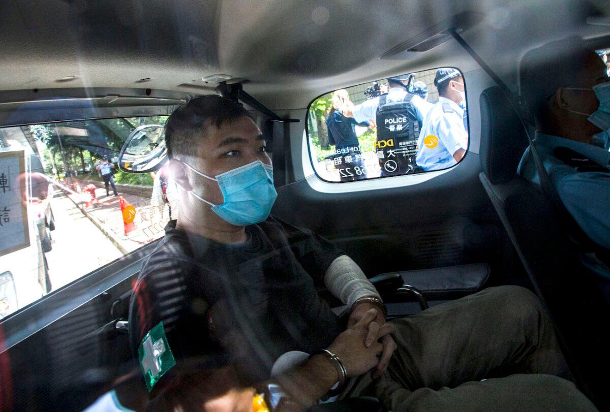 Hong Kong defendant Tong Ying-Kit arrives at court in Hong Kong, on July 6, 2020. (Getty Images)