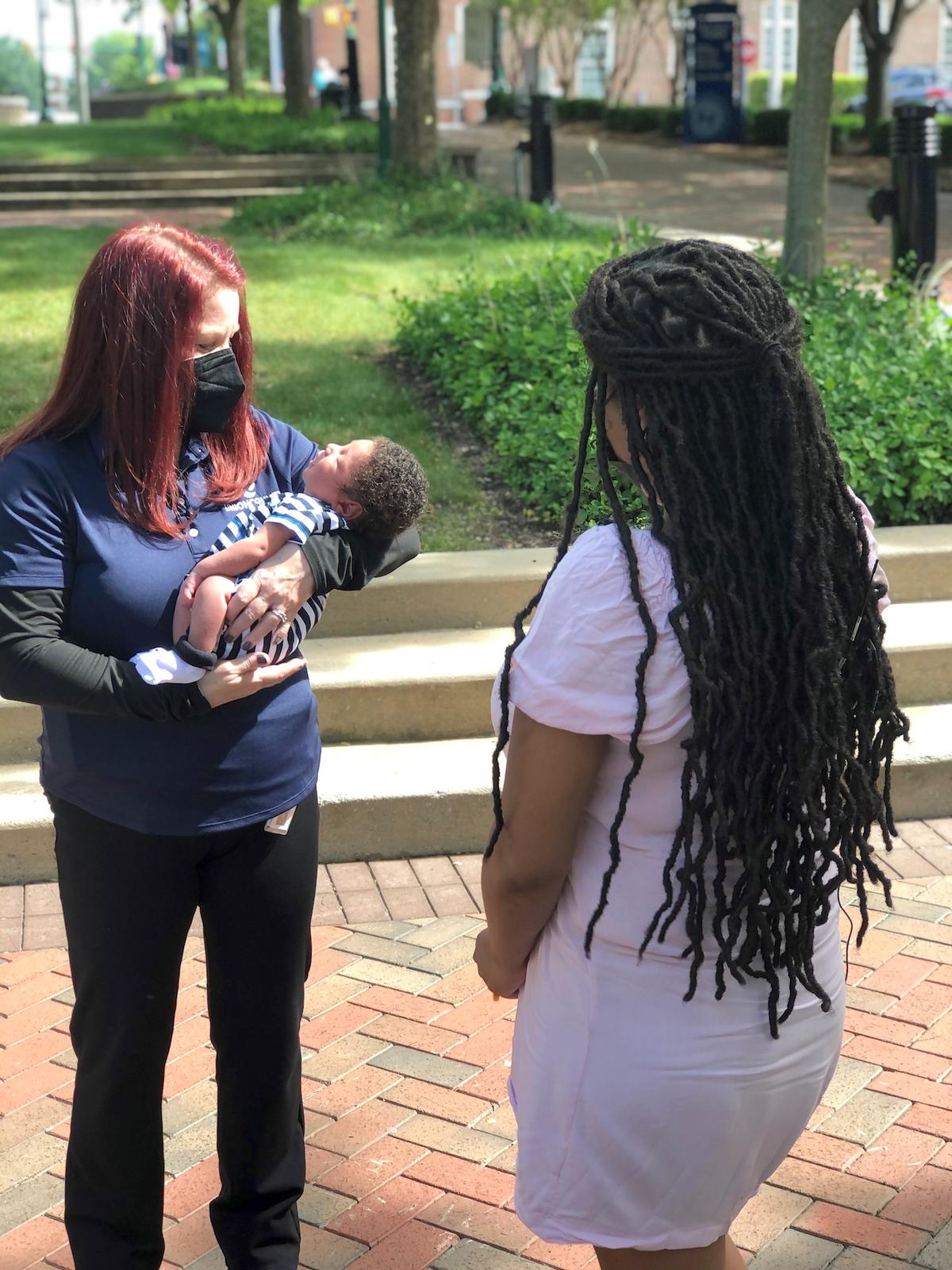 Union County dispatcher Keri Michaels meets Samantha Lockhart and her baby. (Courtesy of <a href="https://www.unioncountync.gov/">Union County Government</a>)