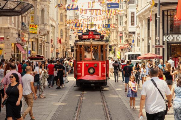 A tram moves along Istiklal Avenue toward Taksim Square in Istanbul on June 9, 2019.  (Vakidzasi/Shutterstock)
