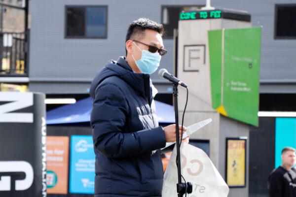 Hong Kong Australian Wing Tang speaks at the “No Beijing 2022” rally in Melbourne, Australia, on June 23, 2021. (The Epoch Times)