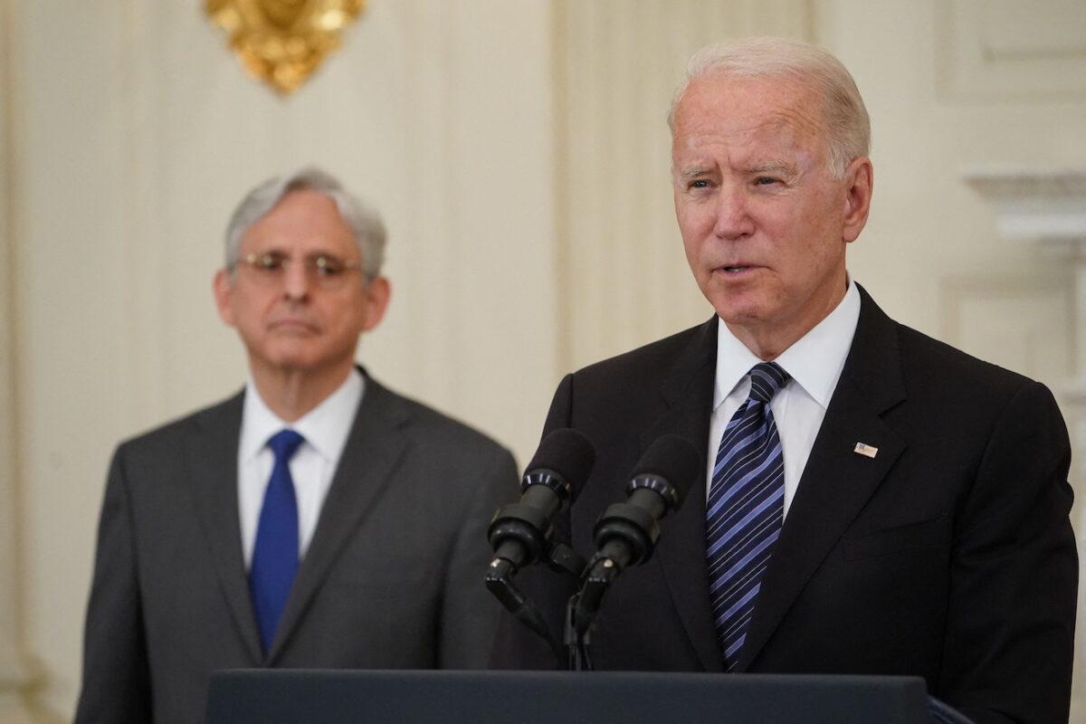 Attorney General Merrick Garland looks on as President Joe Biden speaks about crime prevention at the White House in Washington, on June 23, 2021. (Mandel Ngan/AFP via Getty Images)