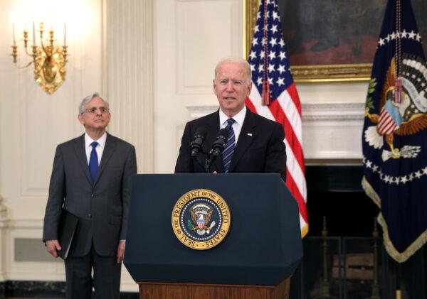 President Joe Biden speaks on gun crime prevention measures as Attorney General Merrick Garland looks on at the White House on June 23, 2021. (Kevin Dietsch/Getty Images)