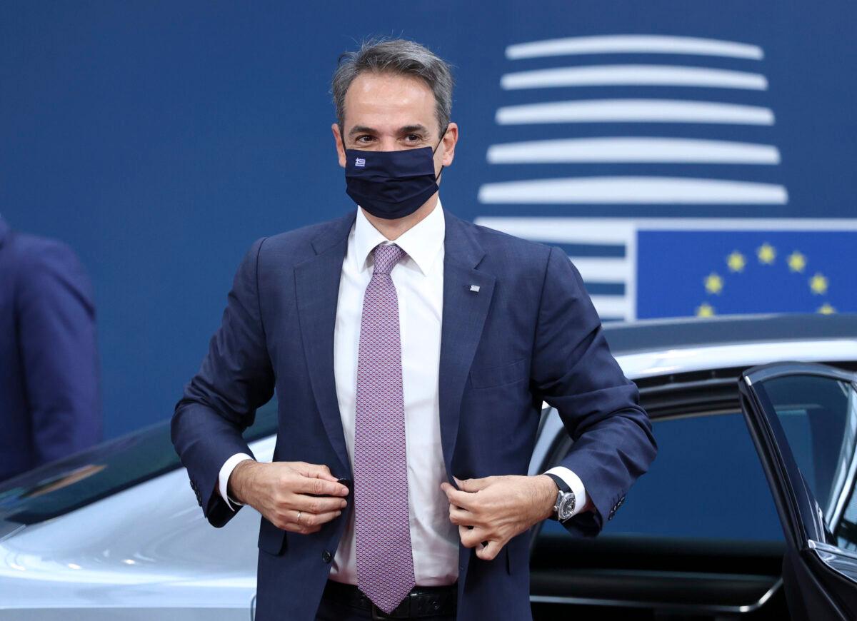 Greek Prime Minister Kyriakos Mitsotakis arrives for an EU summit at the European Council building in Brussels on June 25, 2021. (Aris Oikonomou/Pool/AP Photo)