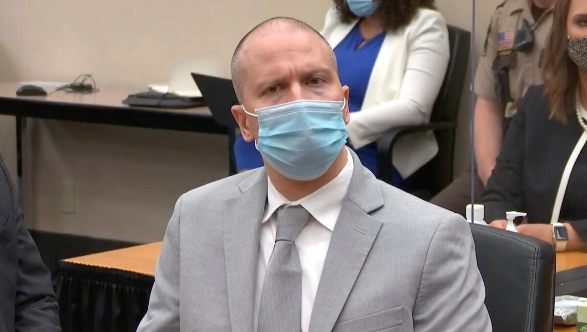 In this image taken from video, former Minneapolis police Officer Derek Chauvin listens as Hennepin County Judge Peter Cahill sentences him to 22 1/2 years in prison, for the May 25, 2020, death of George Floyd, at the Hennepin County Courthouse in Minneapolis, Minn., on June 25, 2021. (Court TV via AP, Pool)