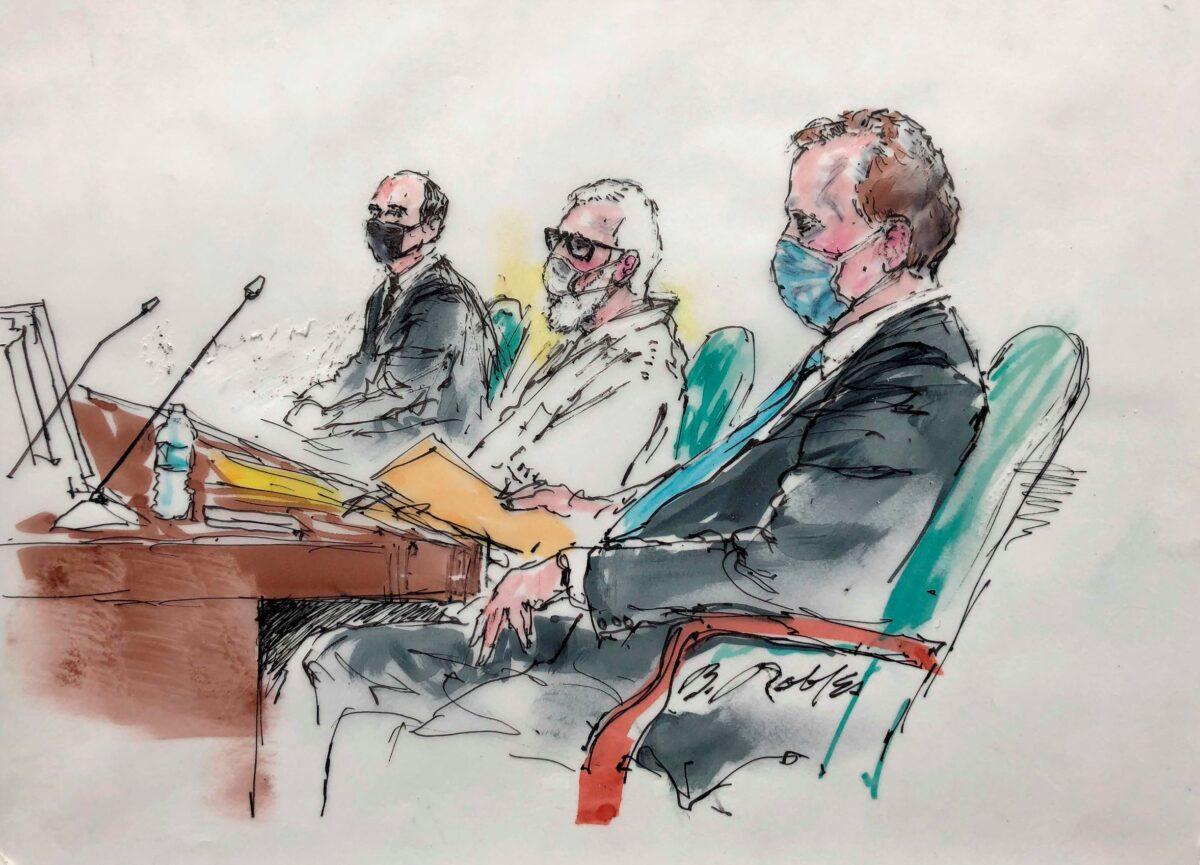 In this courtroom artist sketch, Tahawwur Rana, middle, appears with his attorneys on June 24, 2021.(Bill Robles for AP)