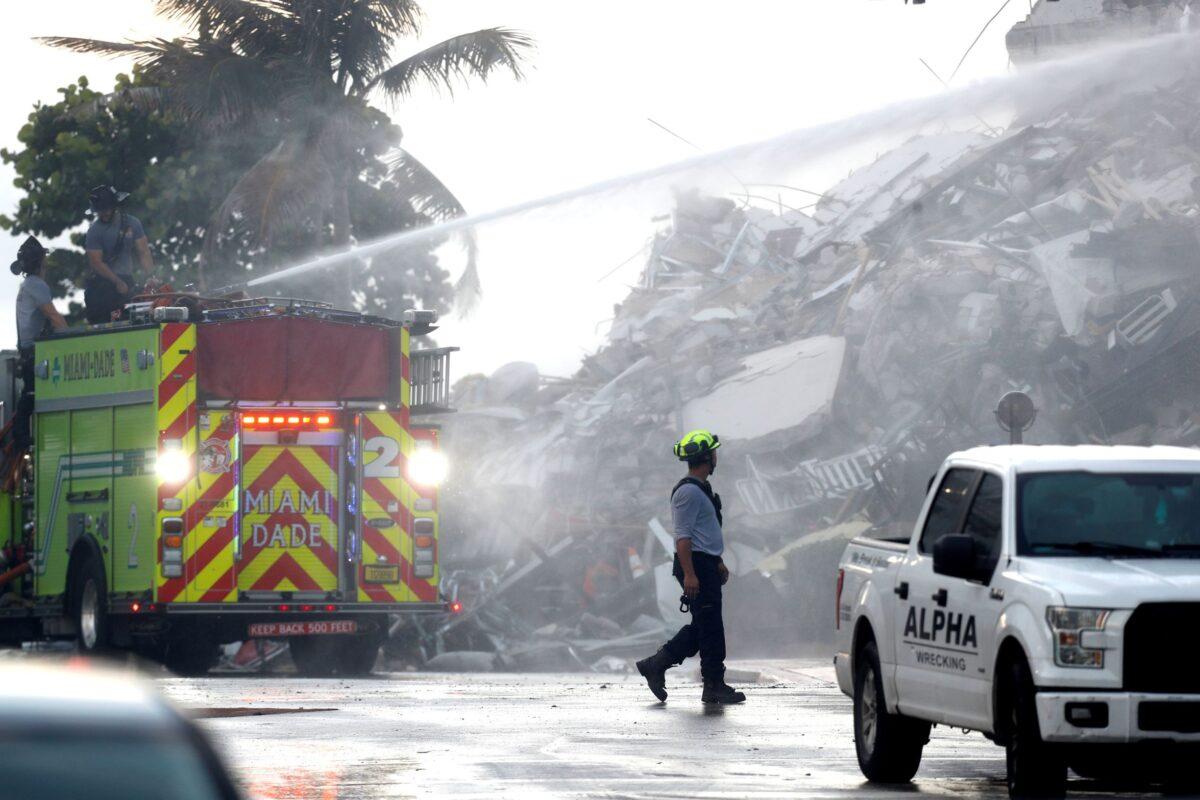 Emergency crews continue search and rescue operations near Miami Beach, Fla., on June 25, 2021. (Octavio Jones/Reuters)
