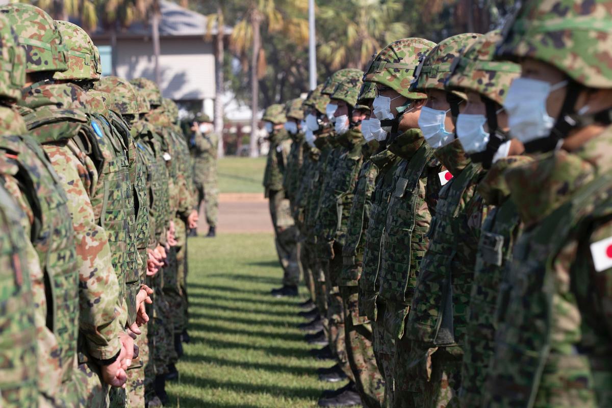 Members of the Japan Ground Self-Defense Force stand in formation during the opening ceremony of Exercise Southern Jackaroo 21 at 1st Brigade Headquarters, at Robertson Barracks in the Northern Territory on June 15, 2021. (PTE Jacob Joseph/ADF)