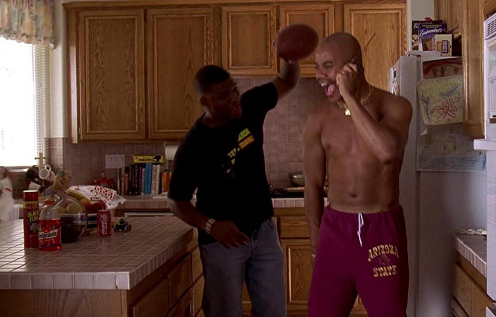 Tee Pee (Aries Spears, L) and brother Rod Tidwell (Cuba Gooding, Jr.) do the famous "Show me the money!" ritual-dance-test in “Jerry Maguire.” (TriStar Pictures)