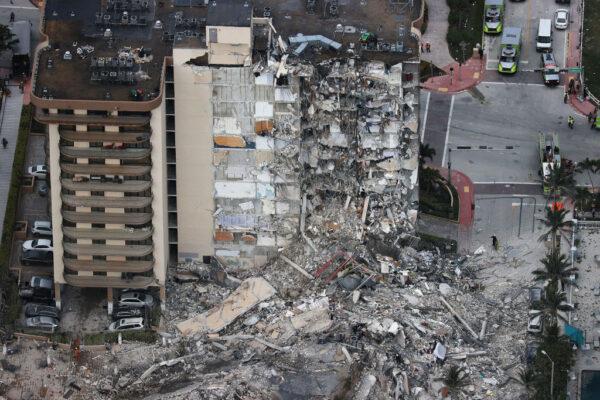 Search and Rescue personnel work after the partial collapse of the 12-story Champlain Towers South condo building in Surfside, Fla., on June 24, 2021. (Joe Raedle/Getty Images)