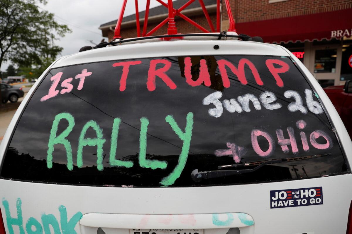A car is painted in support of former President Donald Trump's first post-presidency campaign rally at the Lorain County Fairgrounds, in Wellington, Ohio, on June 25, 2021. (Shannon Stapleton/Reuters)