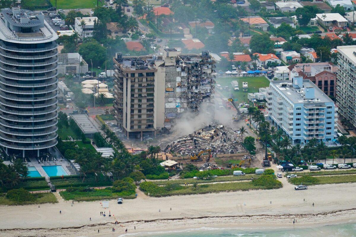 Rescue personnel work in the rubble at the Champlain Towers South Condo, in Surfside, Fla., on June 25, 2021. (Gerald Herbert/AP Photo)