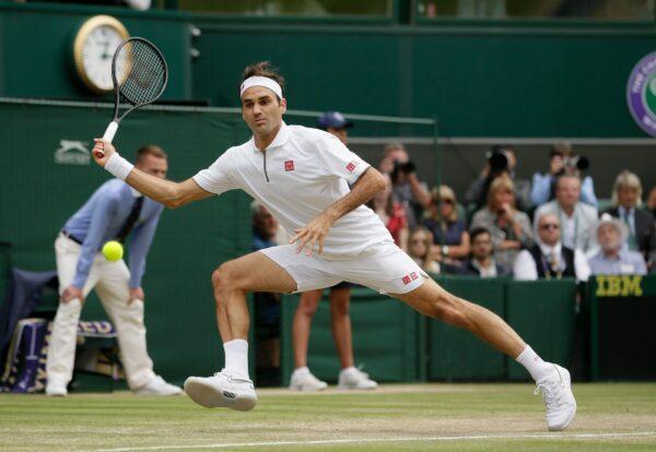 Switzerland's Roger Federer returns the ball to Serbia's Novak Djokovic during the men's singles final match of the Wimbledon Tennis Championships in London, England, on July 14, 2019. (Tim Ireland/File/AP Photo)