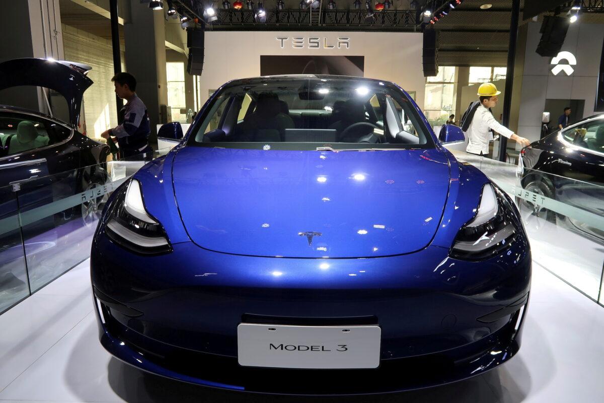 A China-made Tesla Model 3 electric vehicle is seen ahead of the Guangzhou auto show in Guangzhou, Guangdong province, China, on Nov. 21, 2019. (Yilei Sun/Reuters)
