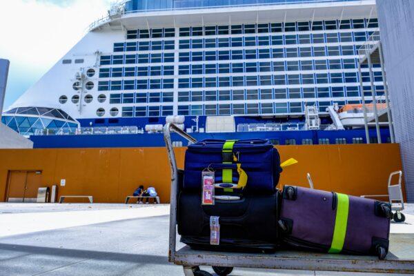 Luggage sits in a cart as it is loaded into the Celebrity Edge cruise ship in Fort Lauderdale, Fla., before it departs on June 26, 2021. (Maria Alejandra/AFP via Getty Images)