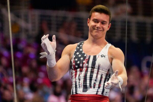 Brody Malone celebrates his performance on the still rings during the men's U.S. Olympic Gymnastics Trials, in St. Louis, Mo., on June 26, 2021. (Jeff Roberson/AP Photo)