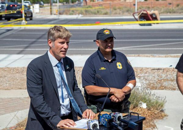 Albuquerque Mayor Tim Keller (L) and Police Chief Harold Medina hold a news conference in Albuquerque, N.M., on June 26, 2021. (Andres Leighton/AP Photo)
