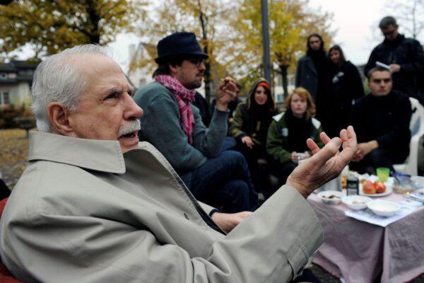 Former Democratic U.S. senator Mike Gravel gestures while talking to "Occupy" activists at Lindenhof square in Zurich, Switzerland, on Oct. 31, 2011. (Keystone, Steffen Schmidt/File/AP Photo)