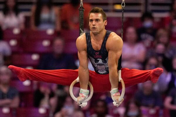 Sam Mikulak competes on the still rings during the men's U.S. Olympic Gymnastics Trials, in St. Louis, Mo., on June 26, 2021. (Jeff Roberson/AP Photo)